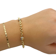 The Gold Charm Bracelet